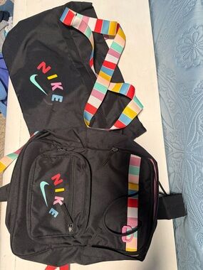 Nike Black Backpack with Multicolor Logo and Striped Strap